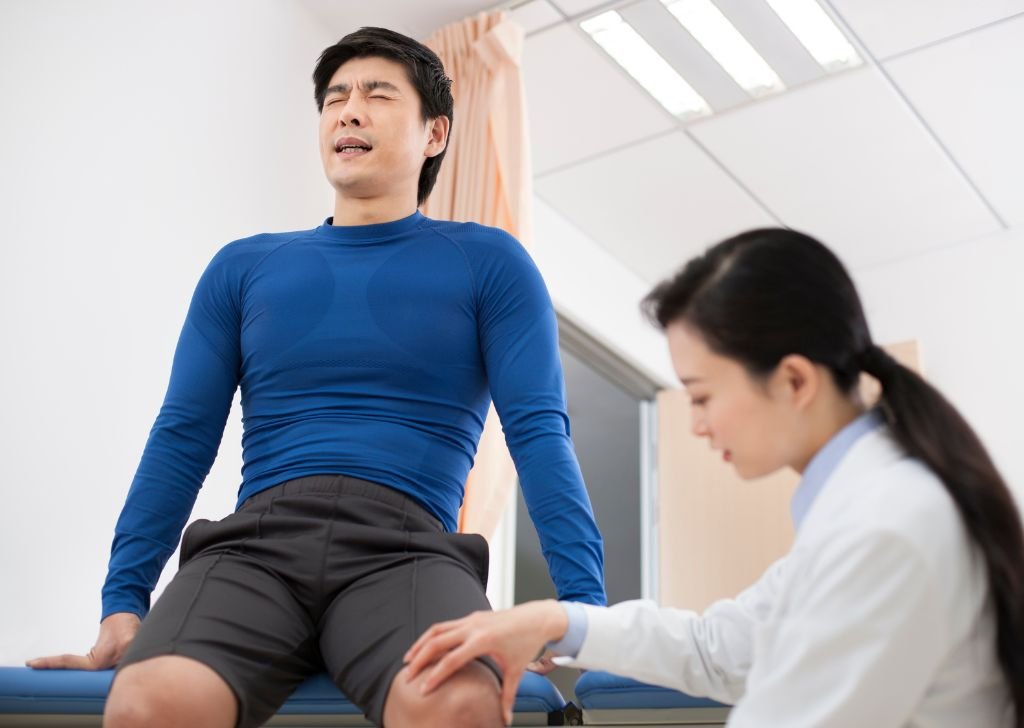 A patient getting their leg checked at a Physiotherapist in Petaling Jaya.