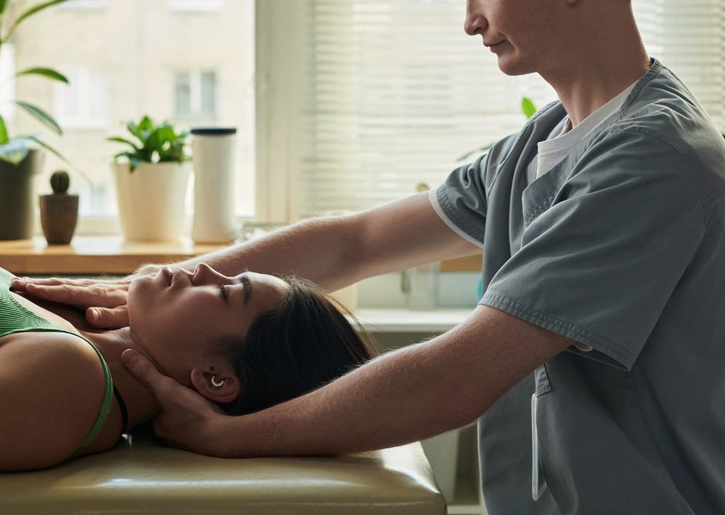 A patient getting chiropractic treatment in Petaling Jaya for scoliosis, Tio Chiro & Physio.