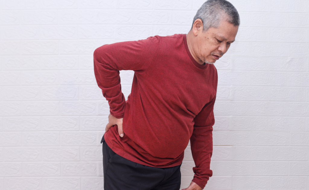 Elderly asian man with lower back pain