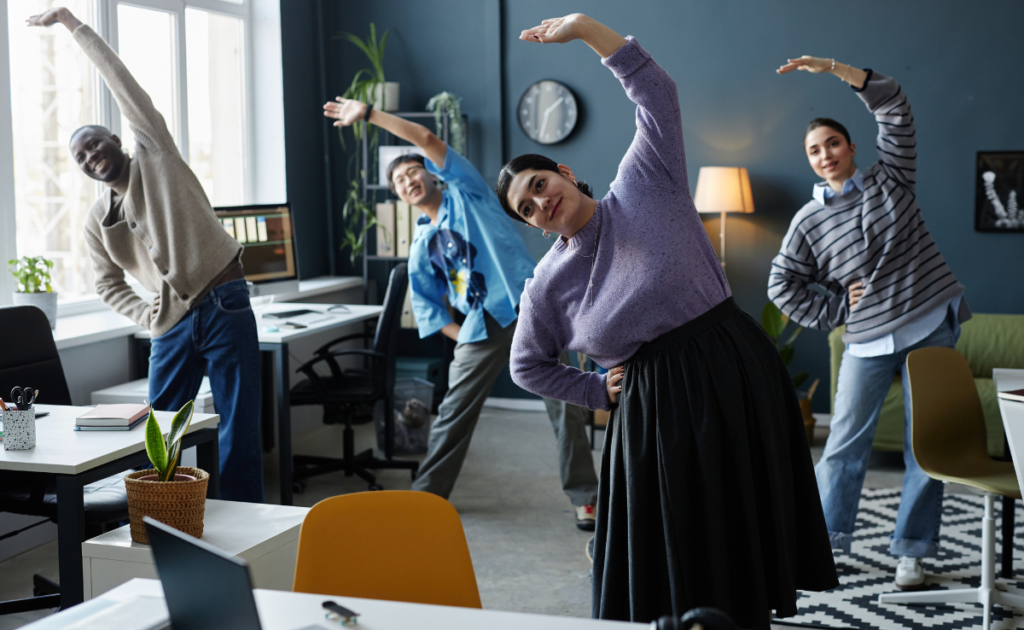 Office workers stretching during break